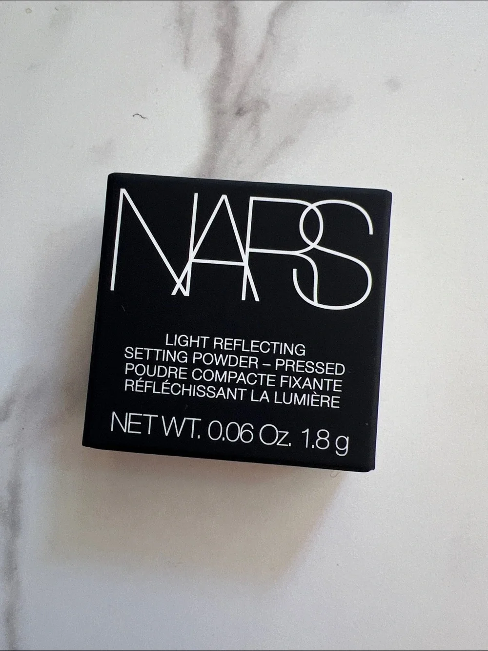 NARS Light Reflecting Pressed Setting Powder — Black Compact